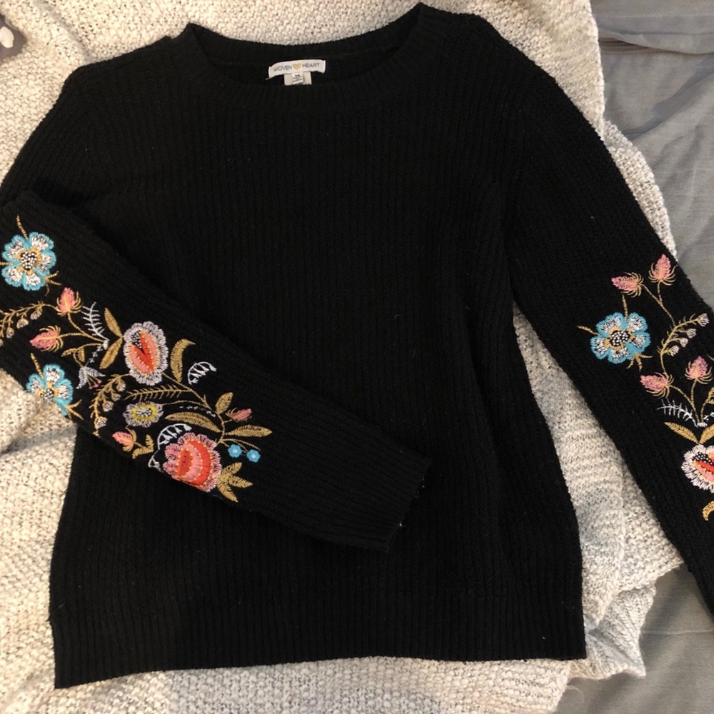 Black sweater with embroidered sleeves